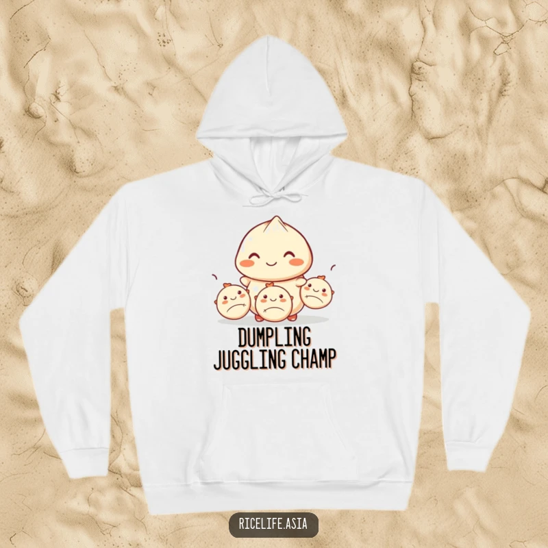 Funny hoodie depicting a smiling dumpling expertly juggling three smaller dumplings, offering warmth and a delicious dose of humor.